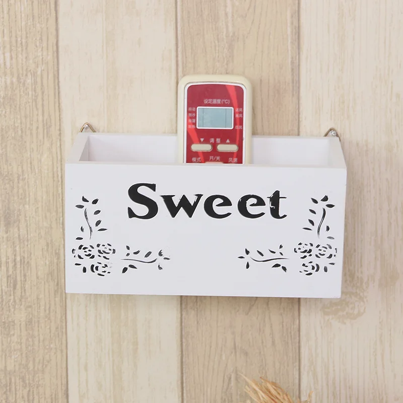 Mobile phone remote control storage box hanging box shelf wall-mounted wall charging rack hanging key on the wall
Mobile phone remote control storage box hanging box shelf wall-mounted wall charging rack hanging key on the wall