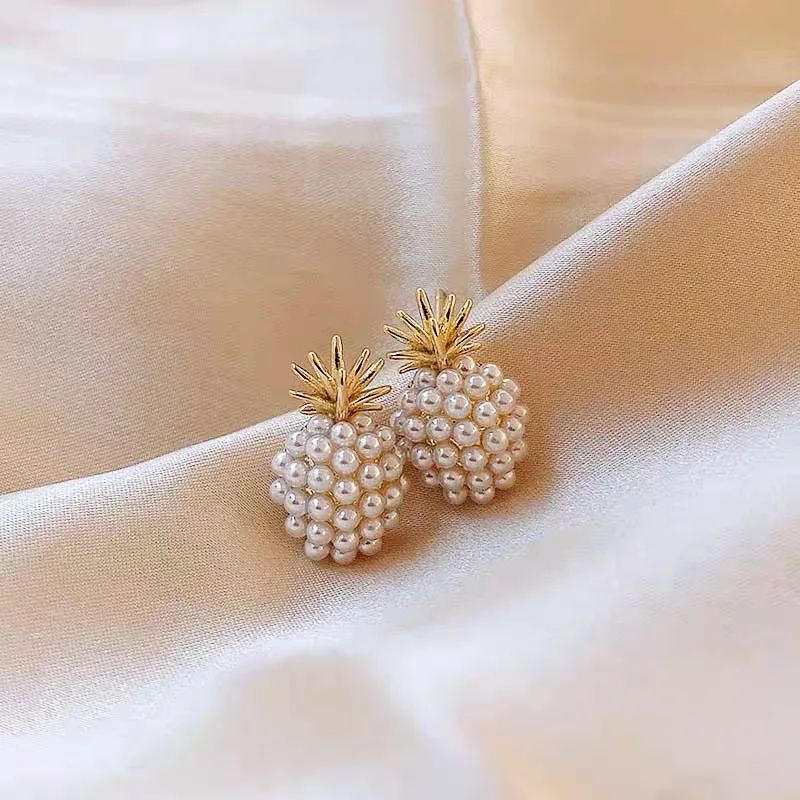 Fashion creative metal imitation pearl pineapple stud earrings women's creative popular campus jewelry accessories
Fashion creative metal imitation pearl pineapple stud earrings women's creative popular campus jewelry accessories