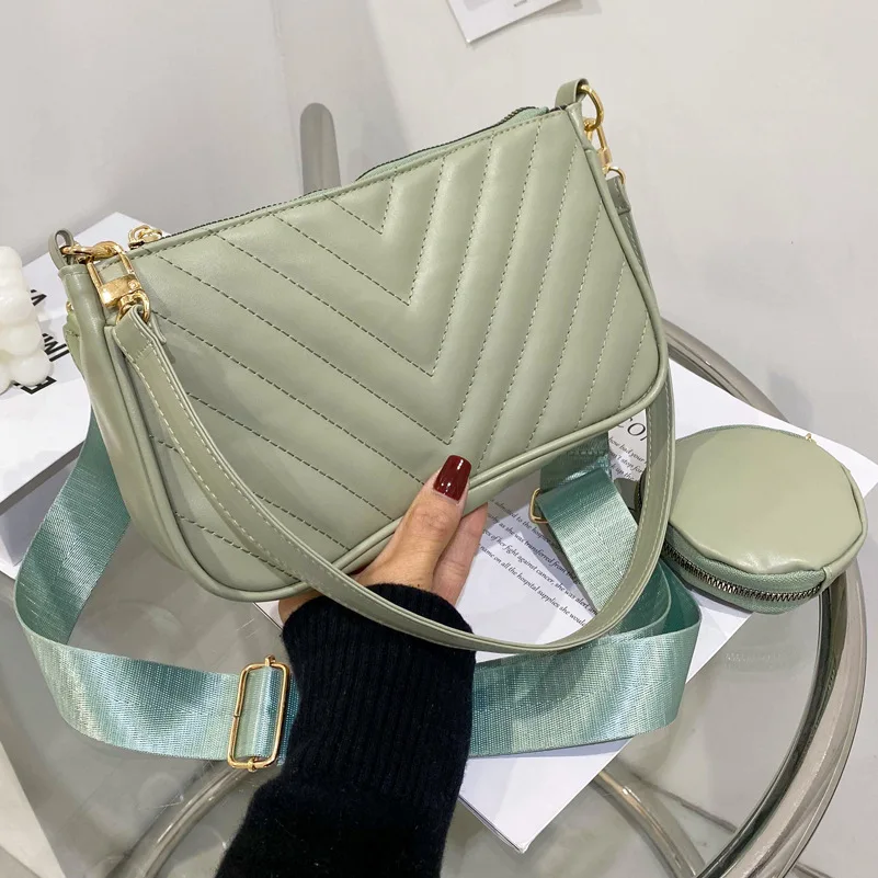 High-quality Underarm Handbags 2021New Wide Shoulder Strap 2-piece Female Bag Rhombus Single Shoulder Messenger Three-in-one Bag
High-quality Underarm Handbags 2021New Wide Shoulder Strap 2-piece Female Bag Rhombus Single Shoulder Messenger Three-in-one Bag