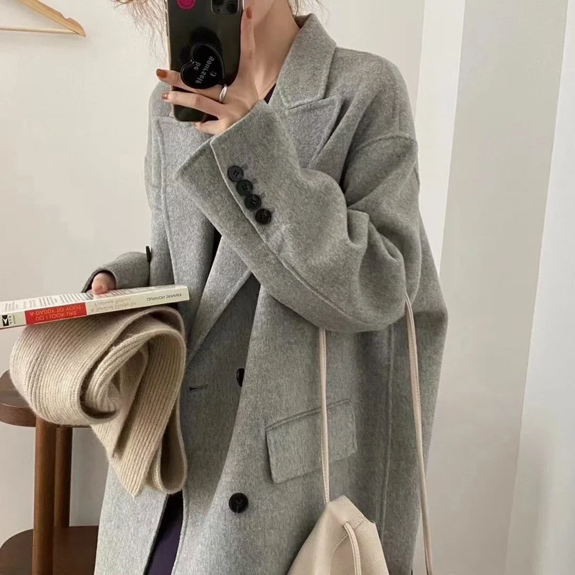 Autumn and Winter New Korean Style Cashmere Wool Double-Sided Handmade Coat Loose Cufflinks High Grade Gray Coat for Women
Autumn and Winter New Korean Style Cashmere Wool Double-Sided Handmade Coat Loose Cufflinks High Grade Gray Coat for Women