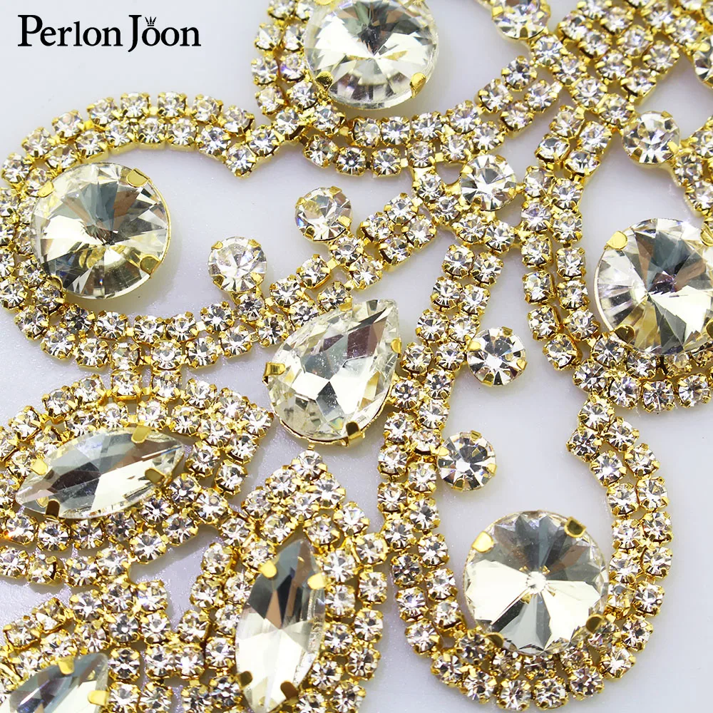 19*7cm DIY Crystal applique Rhinestone patches decoration for the wedding dress sewing Clothing Accessories YH Z003
19*7cm DIY Crystal applique Rhinestone patches decoration for the wedding dress sewing Clothing Accessories YH Z003