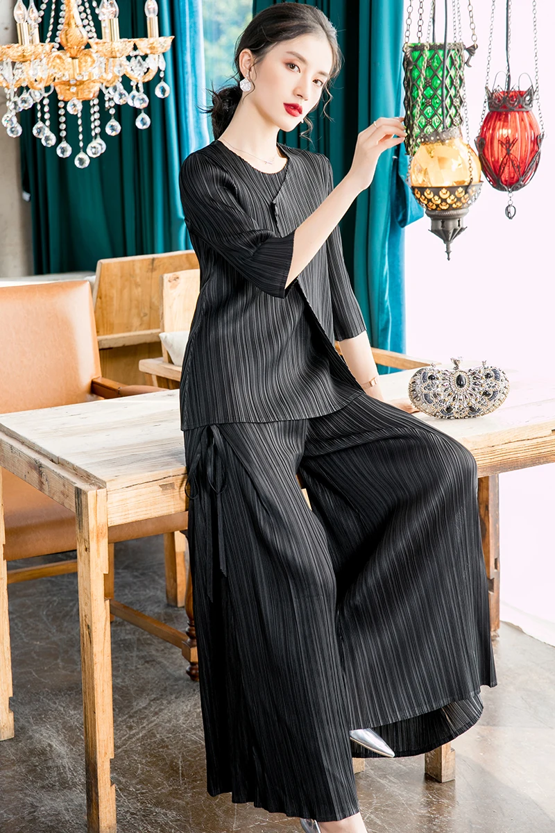 Plus Size Pant Suits Fashion Casual Elastic Loose Miyake Pleated Solid color Round Neck irregular Top + Wide Leg Pants 2 PCS Set
Plus Size Pant Suits Fashion Casual Elastic Loose Miyake Pleated Solid color Round Neck irregular Top + Wide Leg Pants 2 PCS Set