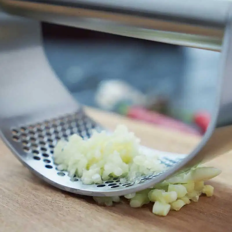 304 stainless steel arc garlic press household manual garlic press kitchen ring garlic press
304 stainless steel arc garlic press household manual garlic press kitchen ring garlic press