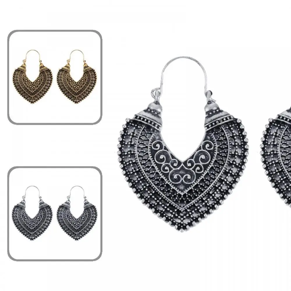 Женские винтажные серьги-подвески в форме сердца
Женские винтажные серьги-подвески в форме сердца