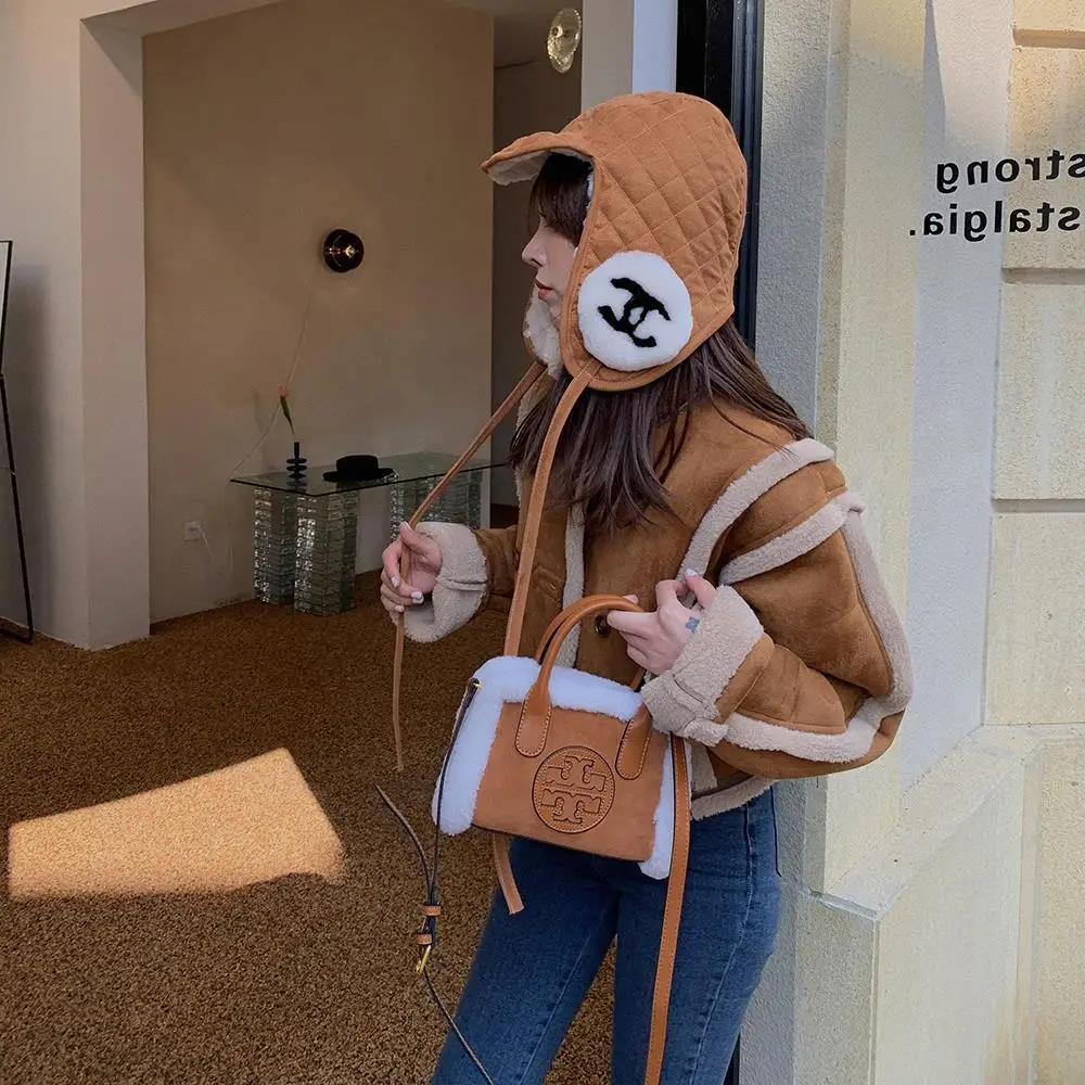 Autumn and winter new women's fashion Korean fashion stitching design sense short coat loose slim cardigan top
Autumn and winter new women's fashion Korean fashion stitching design sense short coat loose slim cardigan top