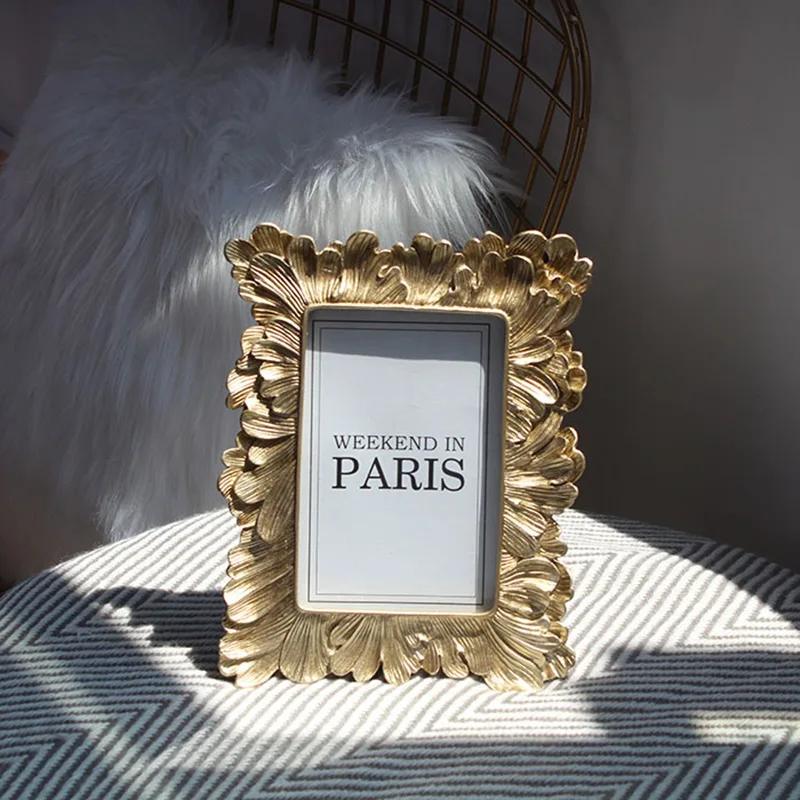 European Retro Golden Creative Photo Frame Feather Literary Fresh Resin Frame Decoration 6 Inches
European Retro Golden Creative Photo Frame Feather Literary Fresh Resin Frame Decoration 6 Inches