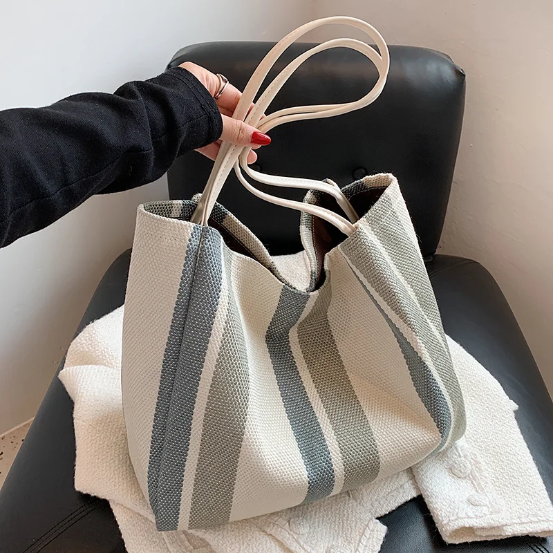 Luxury Designer Cloth Opening High Capacity Tote Handbag for Women 2021 Retro Designer Striped Shopper Shoulder Shopping Bag
Luxury Designer Cloth Opening High Capacity Tote Handbag for Women 2021 Retro Designer Striped Shopper Shoulder Shopping Bag