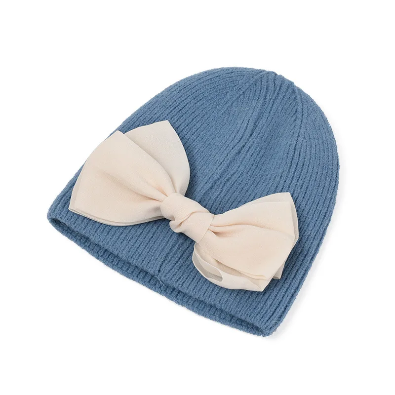 Autumn and winter Acrylic lovely bowknot Thicken knitted hat warm hat Skullies cap beanie hat for Women 170
Autumn and winter Acrylic lovely bowknot Thicken knitted hat warm hat Skullies cap beanie hat for Women 170