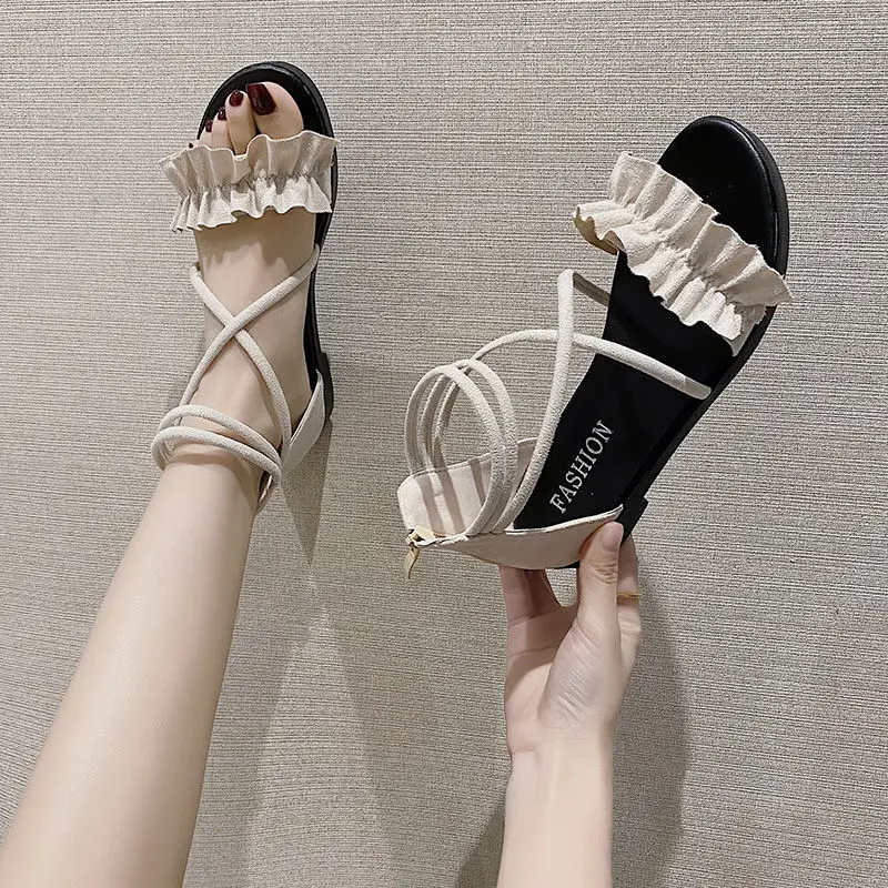 Korean Version of Sandals Female 2021 Summer New Flat-bottomed Flat-heeled All-match Student Cross Straps Rome Beach Fairy Shoes 
Korean Version of Sandals Female 2021 Summer New Flat-bottomed Flat-heeled All-match Student Cross Straps Rome Beach Fairy Shoes