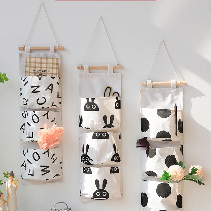 Wall Mounted Wardrobe Organizer Sundries Storage Bag Jewelry Hanging Wall Pouch Hang Cosmetics Toys Organizer Dormitory Bedroom
Wall Mounted Wardrobe Organizer Sundries Storage Bag Jewelry Hanging Wall Pouch Hang Cosmetics Toys Organizer Dormitory Bedroom