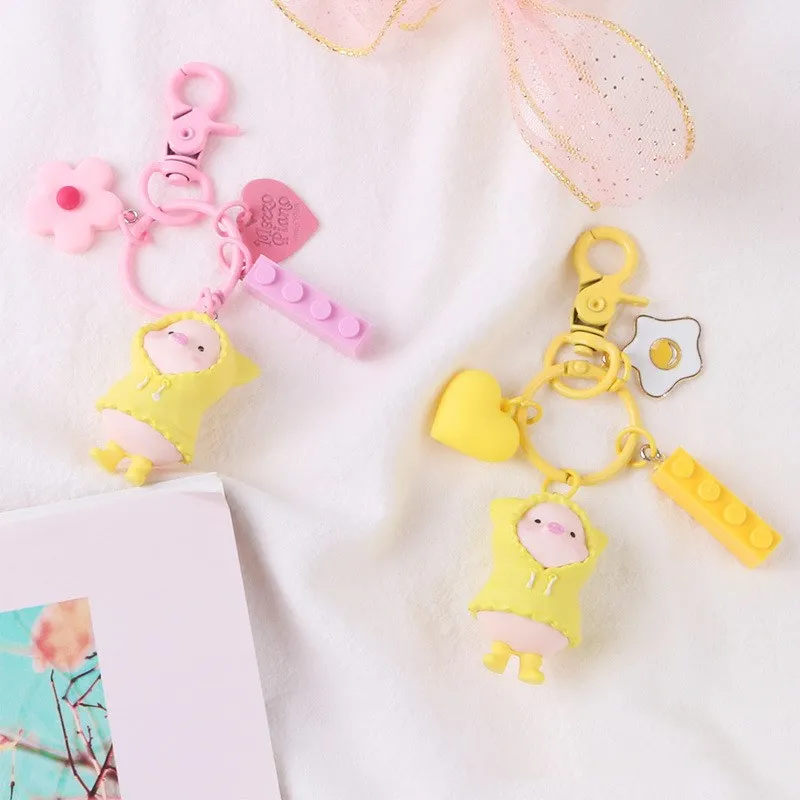New Cloak Coat Piggy Key Ring Lovely Resin Flower Blocks Love Pendant Key Chains Schoolgirl Bags Accessories Key Chain Wholesale
New Cloak Coat Piggy Key Ring Lovely Resin Flower Blocks Love Pendant Key Chains Schoolgirl Bags Accessories Key Chain Wholesale