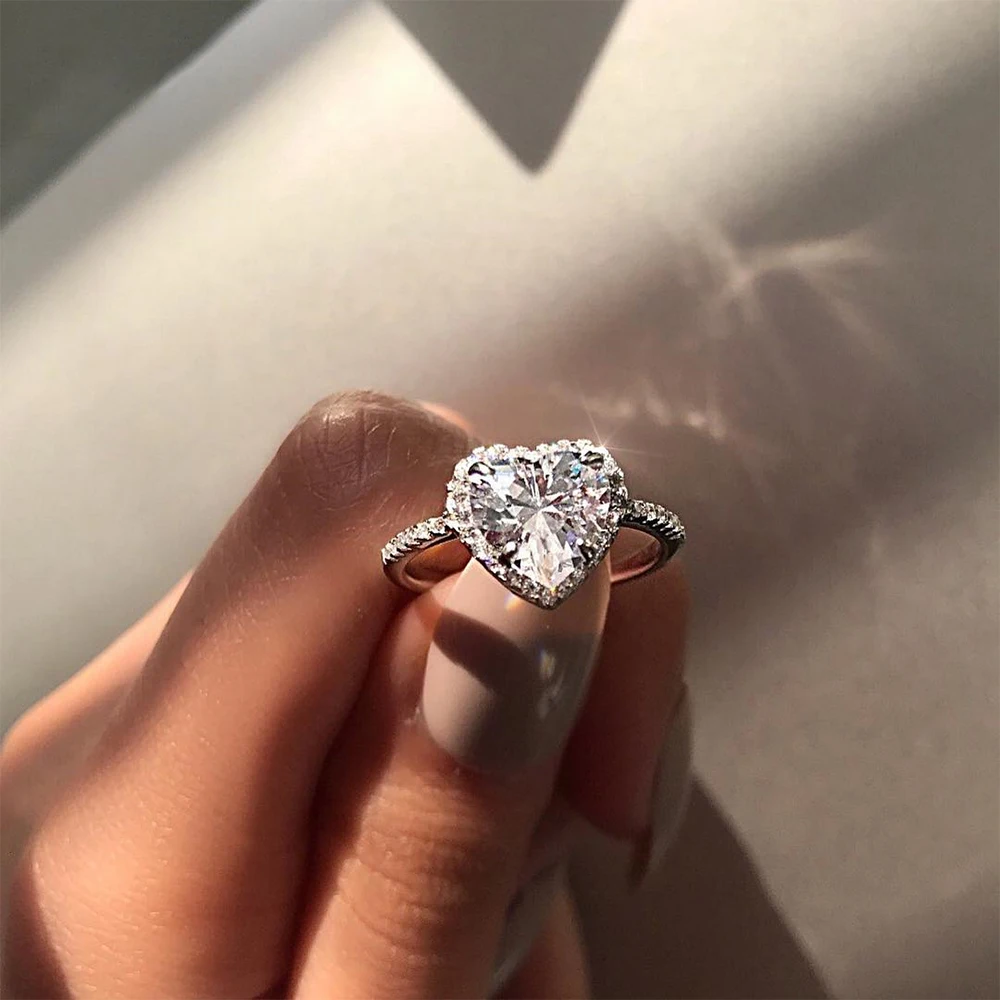 New Fashion Heart Shaped Wedding Rings for Women Zircon Engagement Rings Glamour Jewelry
New Fashion Heart Shaped Wedding Rings for Women Zircon Engagement Rings Glamour Jewelry