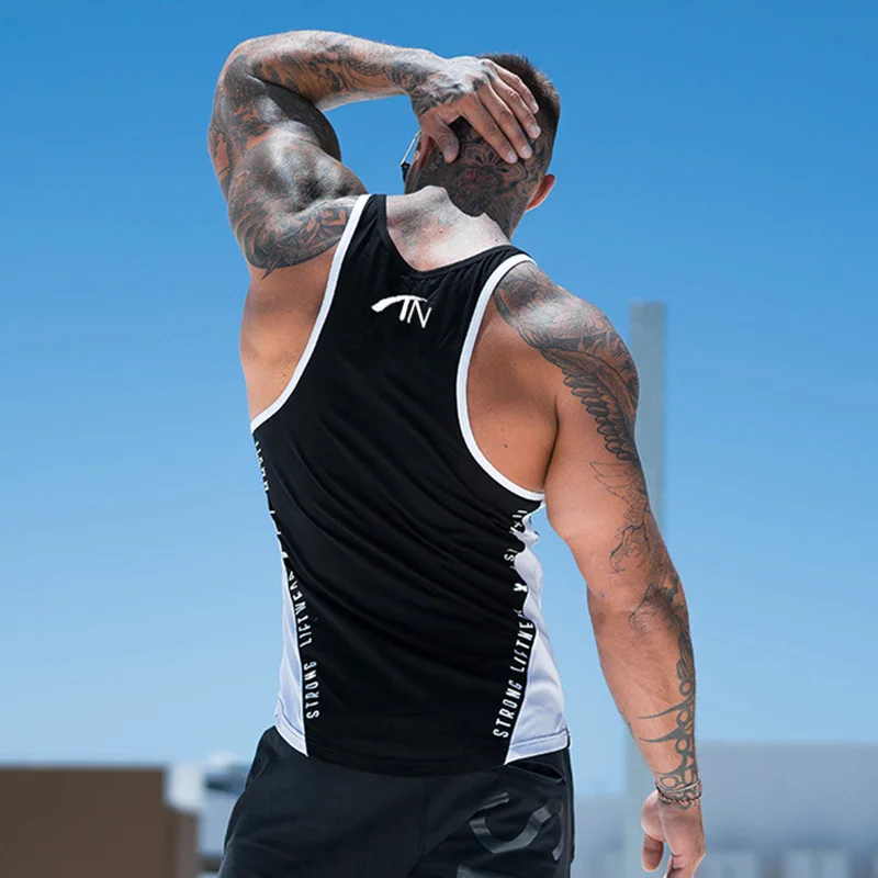 Men Bodybuilding Tank Tops Gym Workout Fitness Cotton Sleeveless shirt Running Clothes Stringer Singlet Male Summer Casual Vest
Men Bodybuilding Tank Tops Gym Workout Fitness Cotton Sleeveless shirt Running Clothes Stringer Singlet Male Summer Casual Vest