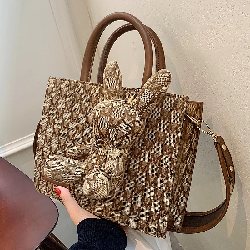 2022 Luxury brand Ladies Tote bag Summer New High-quality Jacquard Women's Designer Handbag High capacity Shoulder Messenger Bag
2022 Luxury brand Ladies Tote bag Summer New High-quality Jacquard Women's Designer Handbag High capacity Shoulder Messenger Bag