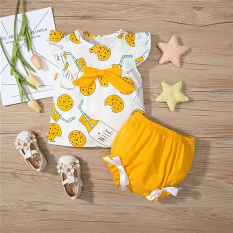 2Pcs Fashion Baby Girls Clothes Summer Cookies Drink Printing Round Collar Fly Sleeve Top + Triangle Lace Shorts
2Pcs Fashion Baby Girls Clothes Summer Cookies Drink Printing Round Collar Fly Sleeve Top + Triangle Lace Shorts