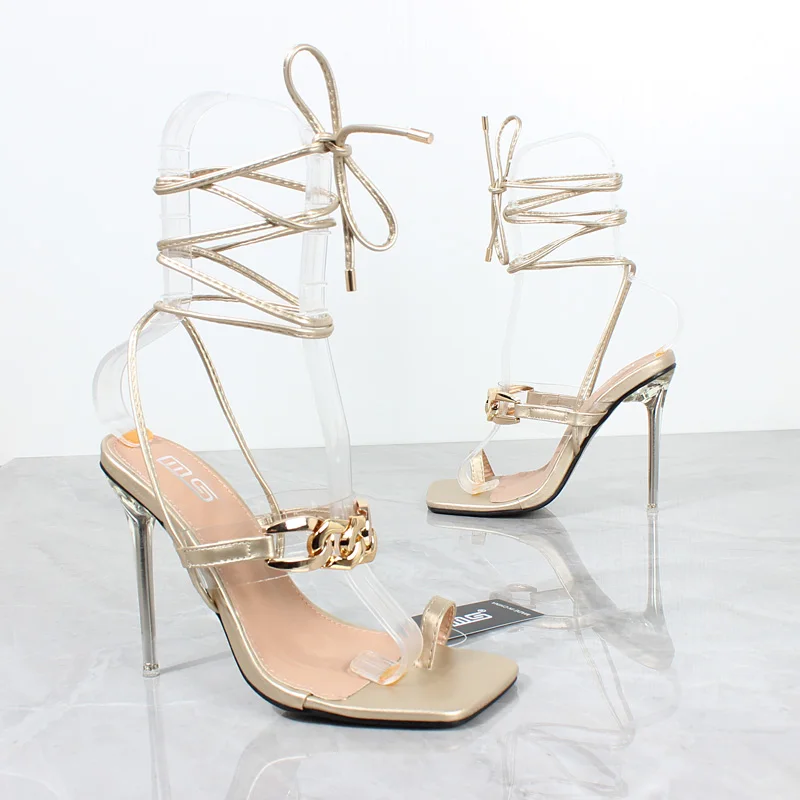 Женские босоножки на высоком каблуке, Новинка лета 2022, комплект из искусственной кожи, пикантная женская обувь на шпильке с цепочкой и ремеш... 
Женские босоножки на высоком каблуке, Новинка лета 2022, комплект из искусственной кожи, пикантная женская обувь на шпильке с цепочкой и ремеш...