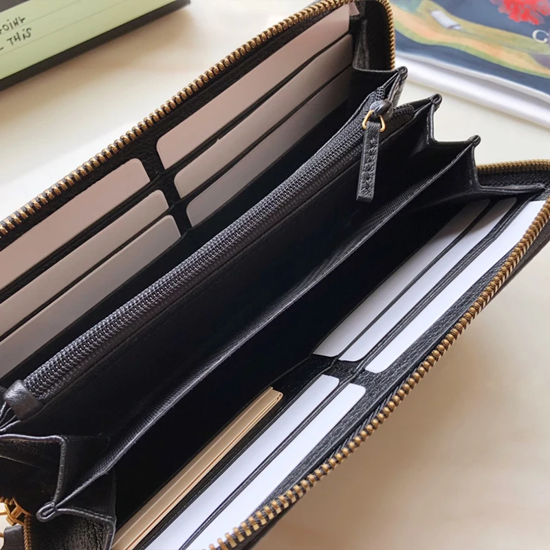 2021 new top women and men leather short wallet luxury brand G zipper mobile phone bag Coin Purse
2021 new top women and men leather short wallet luxury brand G zipper mobile phone bag Coin Purse