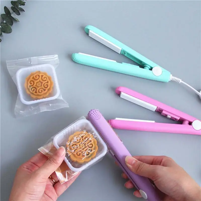 Creative Practical Household Multifuncational Food Vacuum Sealer Bag Clip Handheld Mini Portable Electric Heat Sealing Machine
Creative Practical Household Multifuncational Food Vacuum Sealer Bag Clip Handheld Mini Portable Electric Heat Sealing Machine