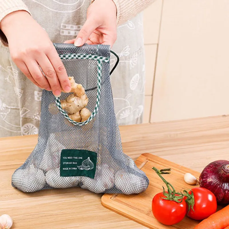Kitchen Fruit And Vegetable Storage Mesh Bag Household Multi-Purpose Fruit Wall Hanging Bag Can Hang Onion Garlic Storage Bag
Kitchen Fruit And Vegetable Storage Mesh Bag Household Multi-Purpose Fruit Wall Hanging Bag Can Hang Onion Garlic Storage Bag