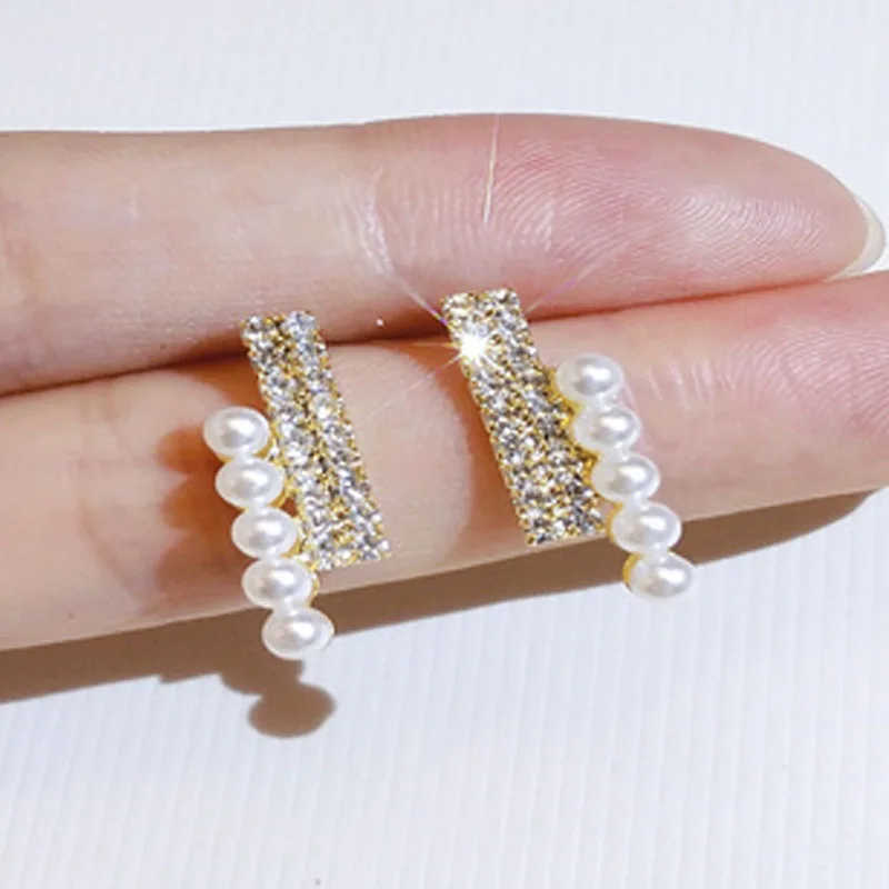 Milangirl Elegant Shiny AAA Zircon Simulated Pearl Stud Earrings Simple Fashion Korean Girl Women Party Wedding Bridal Jewelry
Milangirl Elegant Shiny AAA Zircon Simulated Pearl Stud Earrings Simple Fashion Korean Girl Women Party Wedding Bridal Jewelry