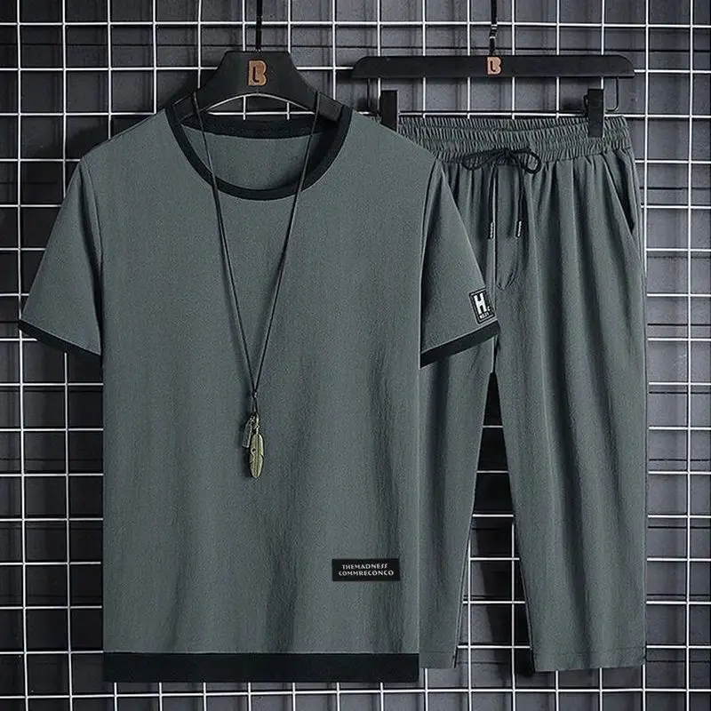 Ice silk suit men's summer short sleeve Capris two piece set sweat absorbing and breathable loose large casual sports suit men's
Ice silk suit men's summer short sleeve Capris two piece set sweat absorbing and breathable loose large casual sports suit men's