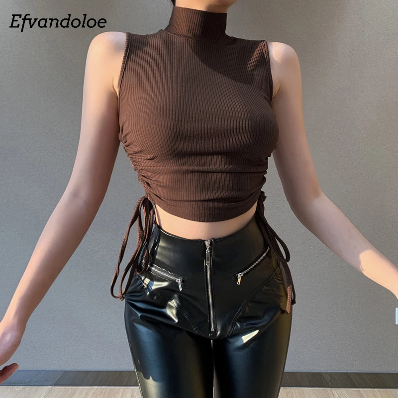 Женский сексуальный бандажный топ на шнуровке, укороченные топы без рукавов с высоким воротником, облегающие эластичные Топы 2021
Женский сексуальный бандажный топ на шнуровке, укороченные топы без рукавов с высоким воротником, облегающие эластичные Топы 2021