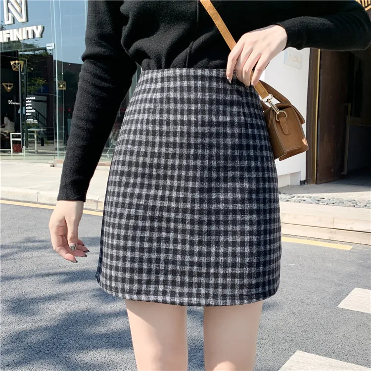 Large size M-4XL Autumn and winter large size small skirt female fat mm woolen plaid high waist was thin 200 kg a word skirt 
Large size M-4XL Autumn and winter large size small skirt female fat mm woolen plaid high waist was thin 200 kg a word skirt