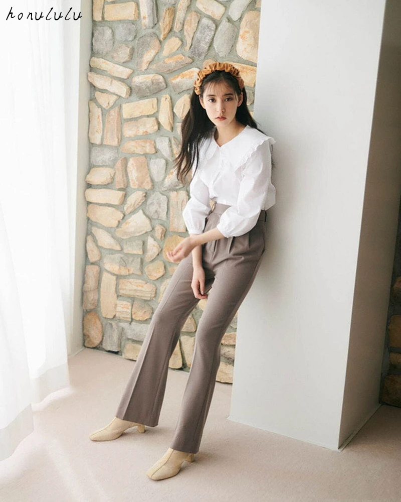 2021 spring new Japanese solid color ruffled lapel long-sleeved shirt with wood ears for women
2021 spring new Japanese solid color ruffled lapel long-sleeved shirt with wood ears for women