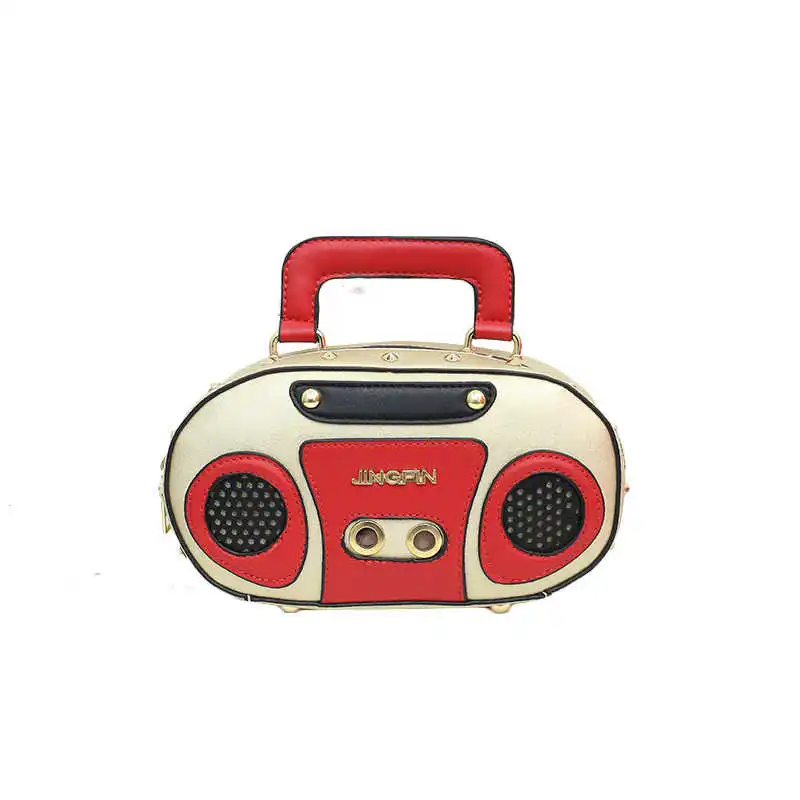 Fashion simulation radio stereo shoulder bag funny personality cross rivet messenger bag for women
Fashion simulation radio stereo shoulder bag funny personality cross rivet messenger bag for women