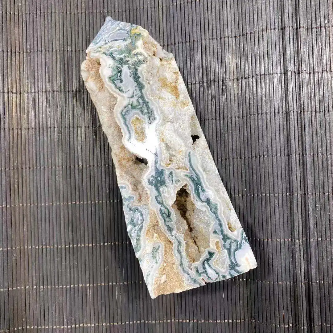 Natural moss agate crystal quartz energy tower a large number of natural crystal holes
Natural moss agate crystal quartz energy tower a large number of natural crystal holes