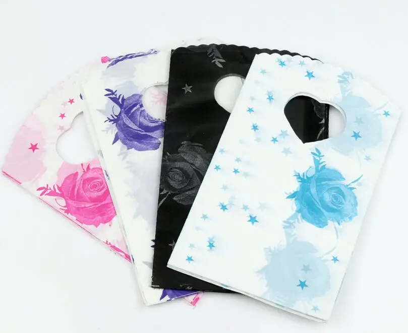 100pcs 4Colors Pink Blue Black Purple Stars Rose Plastic Bag Gift Bags Jewelry Pouches 15X9cm GB002
100pcs 4Colors Pink Blue Black Purple Stars Rose Plastic Bag Gift Bags Jewelry Pouches 15X9cm GB002