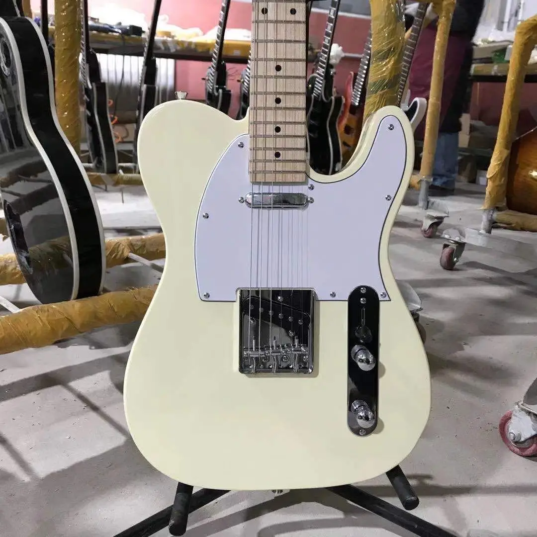 Tele Electric Guitar Cream White Color Maple Fingerboard Chrome Hardware White Pickguard High Quality Free Shipping
Tele Electric Guitar Cream White Color Maple Fingerboard Chrome Hardware White Pickguard High Quality Free Shipping