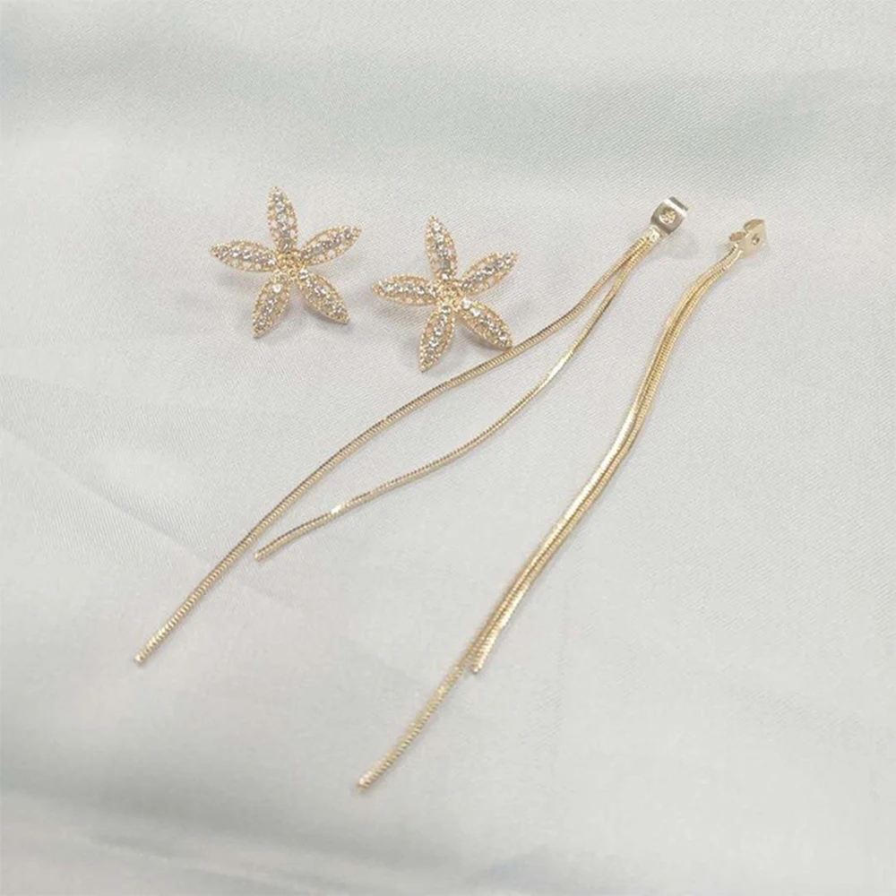South Korea spring and summer new five-leaf flower tassel long earring temperament exquisite elegant Trend Fashion Stud Earrings
South Korea spring and summer new five-leaf flower tassel long earring temperament exquisite elegant Trend Fashion Stud Earrings