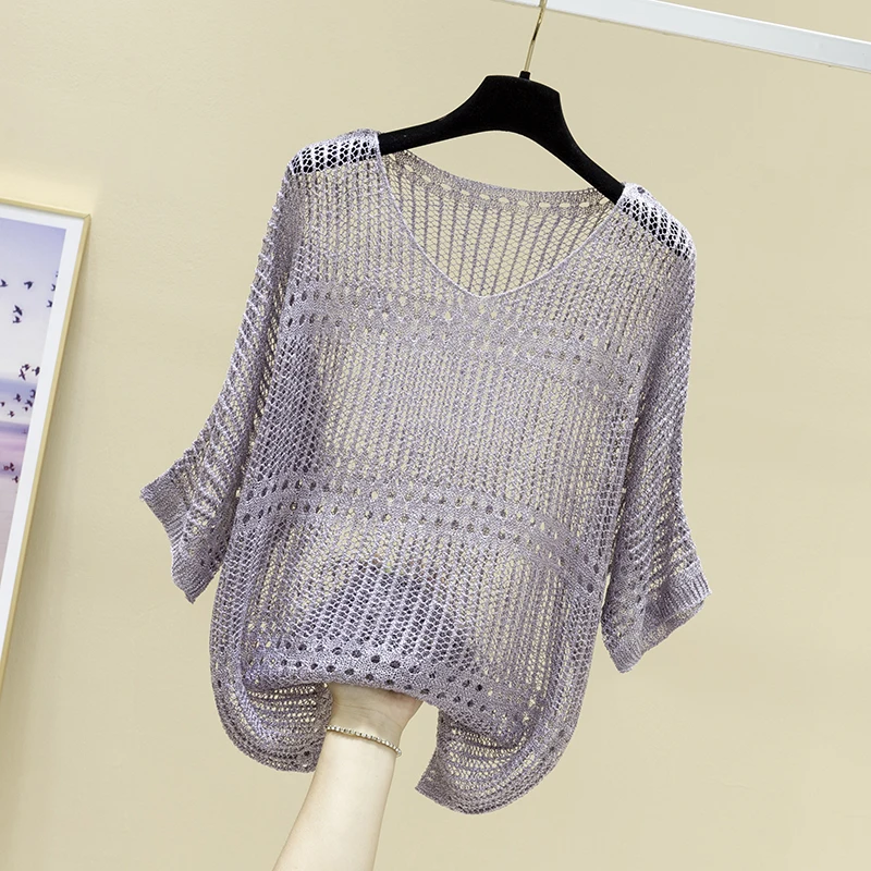The new spring 2021 loose v-neck hollow-out knitting batwing coat joker paragraphs short blouse thin render coat female 
The new spring 2021 loose v-neck hollow-out knitting batwing coat joker paragraphs short blouse thin render coat female