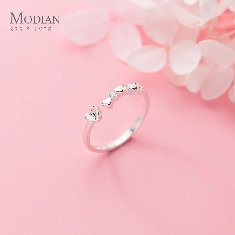 Modian Clear CZ Simple Love Hearts Opening Free Size Ring for Women Girl 925 Sterling Silver Stackable Finger Ring Fine Jewelry
Modian Clear CZ Simple Love Hearts Opening Free Size Ring for Women Girl 925 Sterling Silver Stackable Finger Ring Fine Jewelry