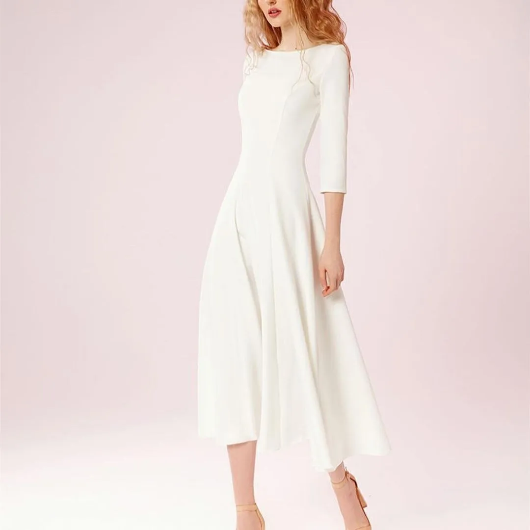 Short Three Quarter O-Neck Wedding Dresses with Pockets A-Line Satin Tea Length Ivory Zipper Back Bridal Dresses
Short Three Quarter O-Neck Wedding Dresses with Pockets A-Line Satin Tea Length Ivory Zipper Back Bridal Dresses