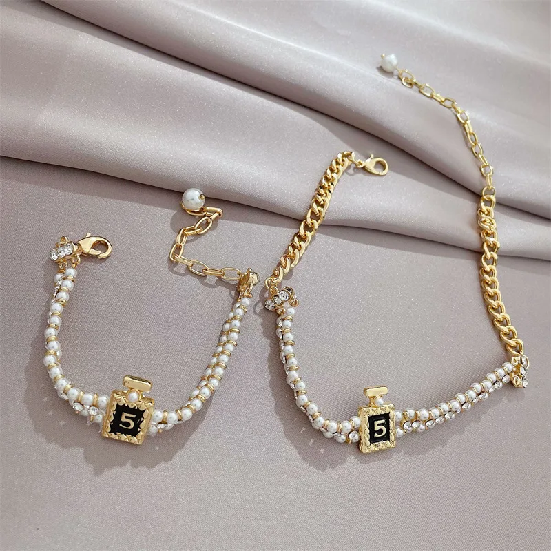 Pearl Necklace for Women Handmade Designer Charms Crystal Number 5 Perfume Bottle Pendant Gifts Luxury Jewelry
Pearl Necklace for Women Handmade Designer Charms Crystal Number 5 Perfume Bottle Pendant Gifts Luxury Jewelry