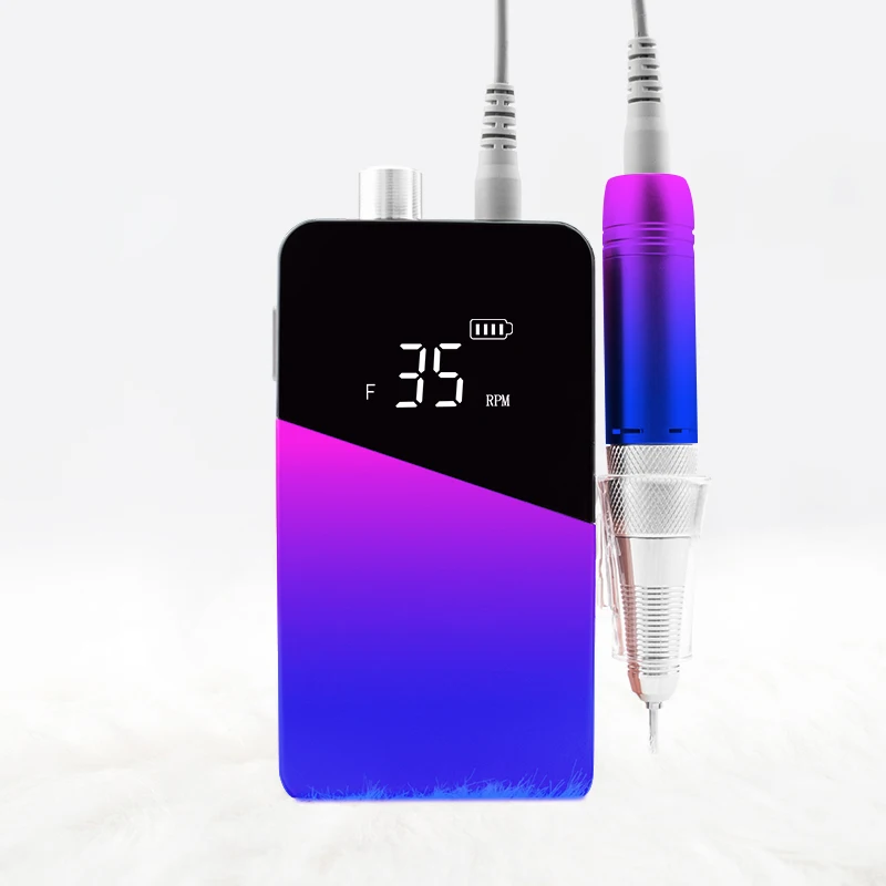 Аккумуляторная портативная машинка для маникюра и педикюра, 35000 об./мин.
Аккумуляторная портативная машинка для маникюра и педикюра, 35000 об./мин.