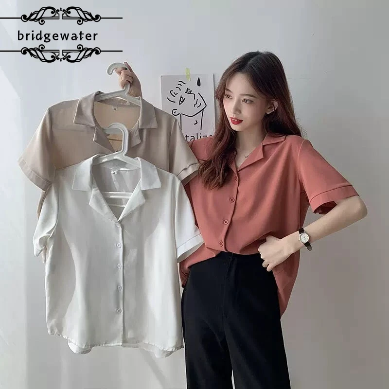 Chiffon short-sleeved female summer new slimming simple solid color V-neck loose women shirts students temperament shirts
Chiffon short-sleeved female summer new slimming simple solid color V-neck loose women shirts students temperament shirts