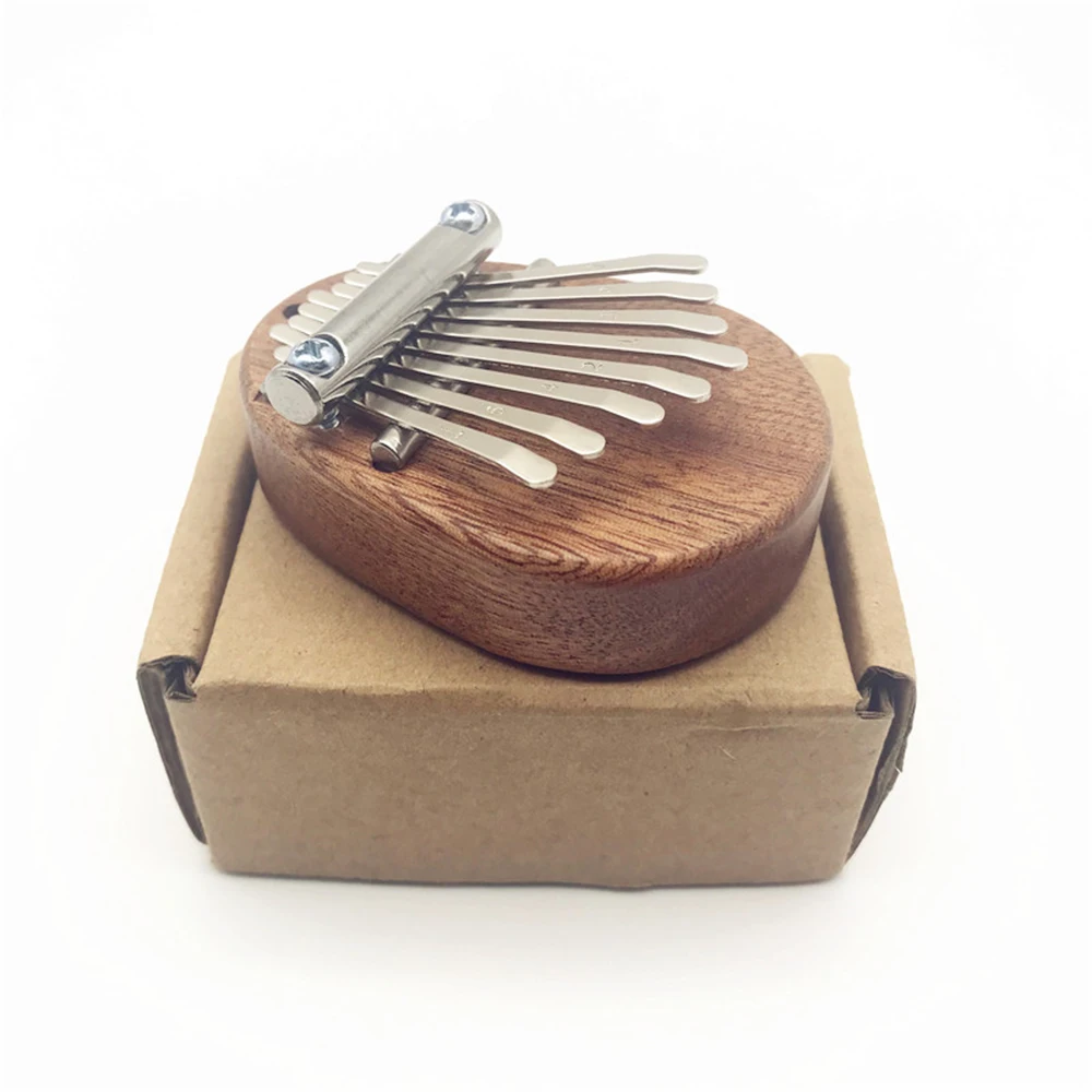 8 Key Mini Kalimba Exquisite Finger Thumb Piano Marimba Musical Good Accessory Pendant Gift Finger Keyboard Musical Instrument
8 Key Mini Kalimba Exquisite Finger Thumb Piano Marimba Musical Good Accessory Pendant Gift Finger Keyboard Musical Instrument