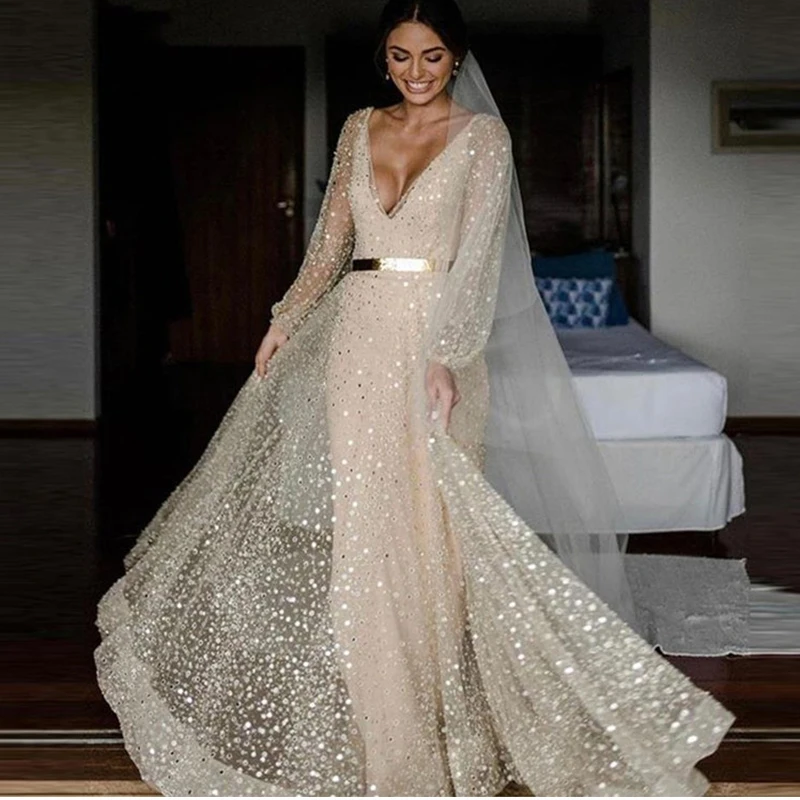 Robe De Marrige Full Sleeves Wedding Dresses 2022 Sheer Illusion V-Neck Sequined A Line Tulle Bridal Gowns
Robe De Marrige Full Sleeves Wedding Dresses 2022 Sheer Illusion V-Neck Sequined A Line Tulle Bridal Gowns