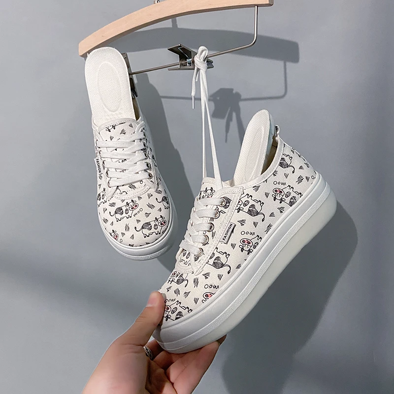 New Women's Vulcanized Shoes Sneakers Girl Casual Fashion Lovely Casual Lace-Up Colorful Canvas Sport Graffiti Board Shoes 2021
New Women's Vulcanized Shoes Sneakers Girl Casual Fashion Lovely Casual Lace-Up Colorful Canvas Sport Graffiti Board Shoes 2021