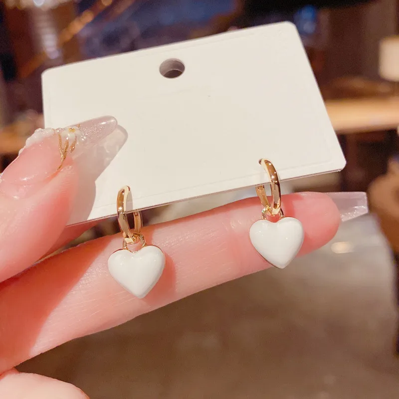 Fashion Cubic White Peach Heart Pendant Earrings Personality Korean Style New Fashion Jewelry
Fashion Cubic White Peach Heart Pendant Earrings Personality Korean Style New Fashion Jewelry