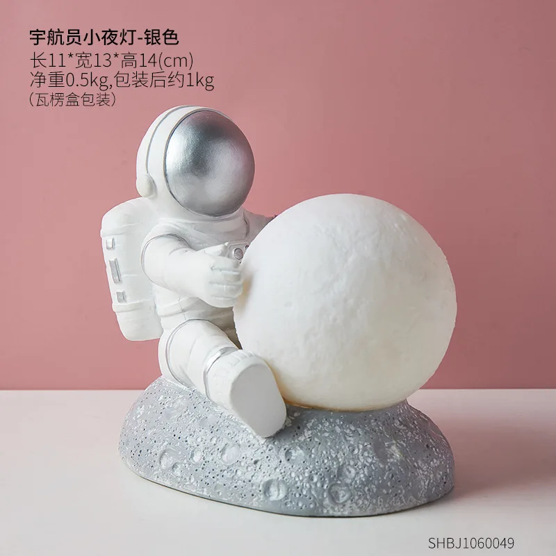 Desk decoration lamp astronaut model small night light decoration bedroom bedside table top creative decoration home accessories
Desk decoration lamp astronaut model small night light decoration bedroom bedside table top creative decoration home accessories