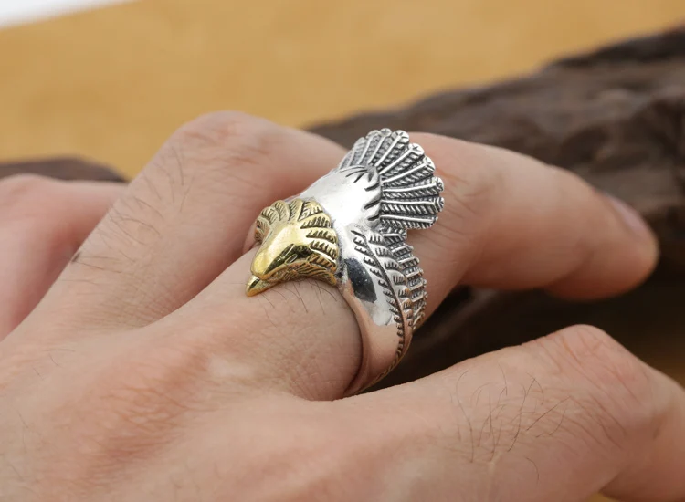 New S925 pure silver jewelry Thai silver domineering golden eagle head personalized flying eagle man ring
New S925 pure silver jewelry Thai silver domineering golden eagle head personalized flying eagle man ring