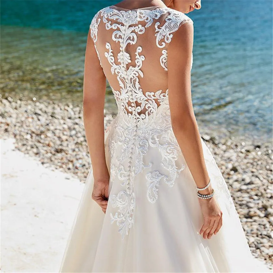 Beach Wedding Dresses A-line Cap Sleeves Tulle Appliques Lace Boho Dubai Arabic Wedding Gown Bridal Dress Vestido De Noiva
Beach Wedding Dresses A-line Cap Sleeves Tulle Appliques Lace Boho Dubai Arabic Wedding Gown Bridal Dress Vestido De Noiva
