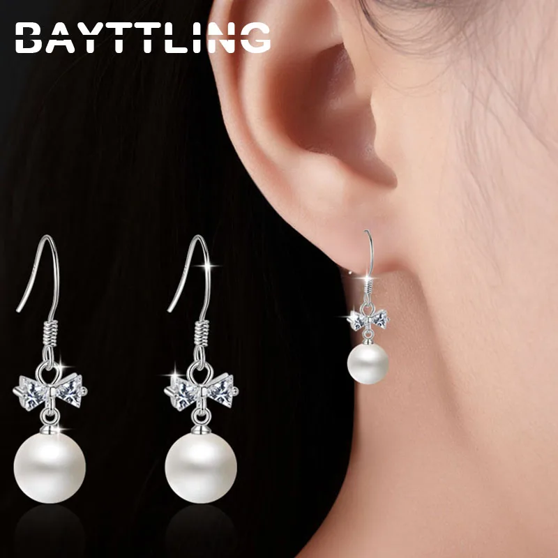 BAYTTLING Silver Color 35MM Fine Shiny Zircon Bowknot Pearl Drop Earrings For Woman Fashion Wedding Party Gift Jewelry
BAYTTLING Silver Color 35MM Fine Shiny Zircon Bowknot Pearl Drop Earrings For Woman Fashion Wedding Party Gift Jewelry
