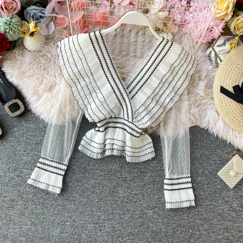 White Black Perspective Mesh Blouse Tops Sexy V-neck Striped Women Shirt 2020 Spring Long Sleeve Slim Waist Blusas 57054
White Black Perspective Mesh Blouse Tops Sexy V-neck Striped Women Shirt 2020 Spring Long Sleeve Slim Waist Blusas 57054