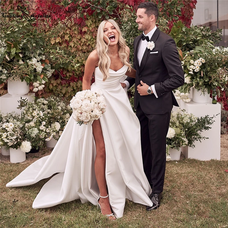 Satin Boho Wedding Dresses 2021 High Slit Strapless A-Line Country Bridal Gowns Beach Bride Dress Vestido De Noiva
Satin Boho Wedding Dresses 2021 High Slit Strapless A-Line Country Bridal Gowns Beach Bride Dress Vestido De Noiva