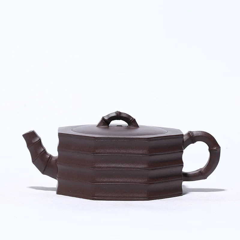 Bafangzhuduan purple clay teapot Yixing raw mine purple clay handmade teapot tea set gift goods 
Bafangzhuduan purple clay teapot Yixing raw mine purple clay handmade teapot tea set gift goods